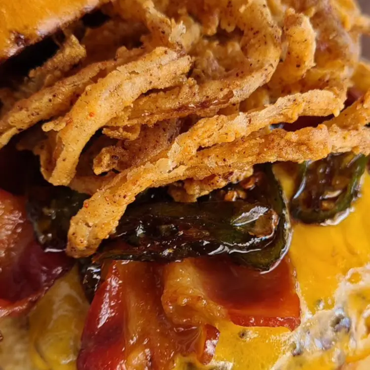 Blackstone Western BBQ Burgers with Crispy Onion Strings